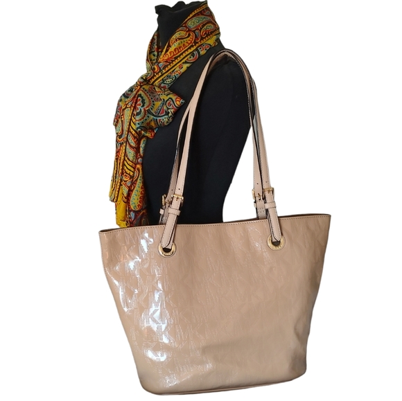 Michael Kors Handbags - MICHAEL KORS Jet Set Large Embossed Signature Logo Patent Leather Tote Nude